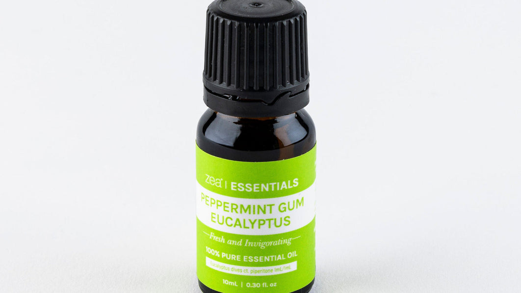 Zea Peppermint Gum Eucalyptus Essential Oil bottle on a plain background