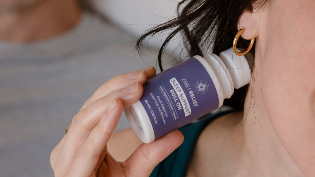 Zea Relief Sleep Support Roll On 40ml on a bedside table as part of a bedtime routine